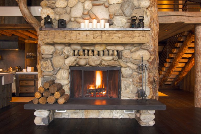 Rustic Fireplace in Log Cabin, How To Insulate Fireplace Not In Use