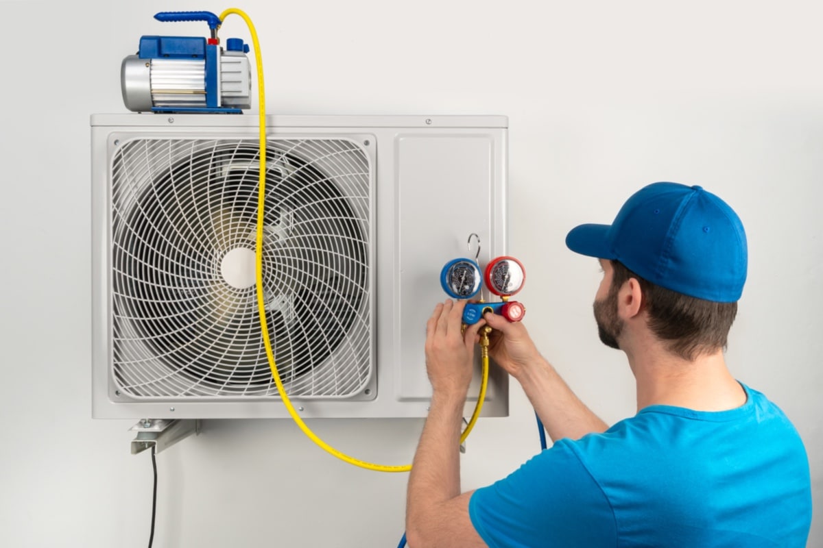 The Compressor is Clogged - Installation service fix repair maintenance of an air conditioner outdoor unit