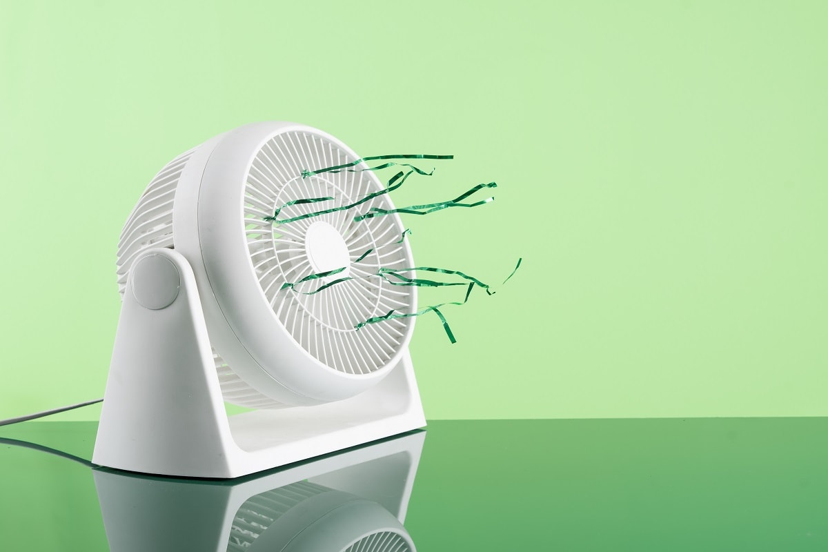 Woozoo fans design - Plastic white electric fan in working mode