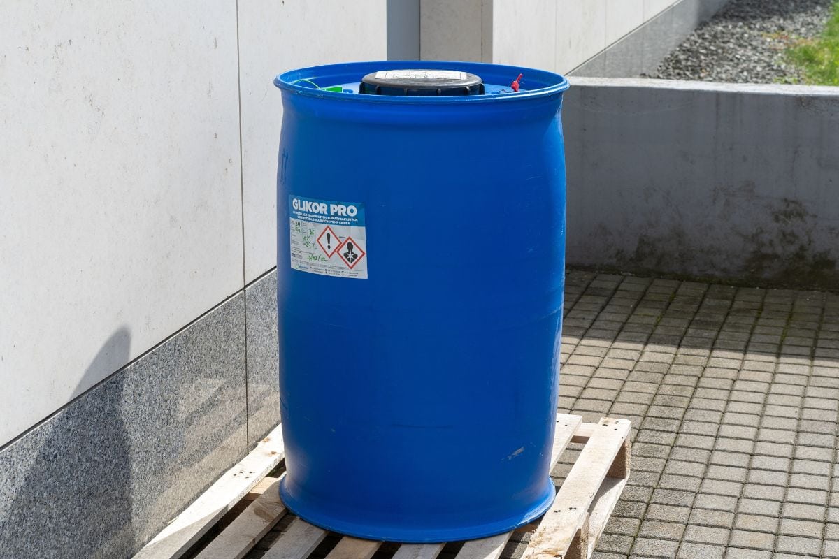 large barrel of made in Poland glycolic agent for filling refrigeration and air conditioning systems standing on a pallet