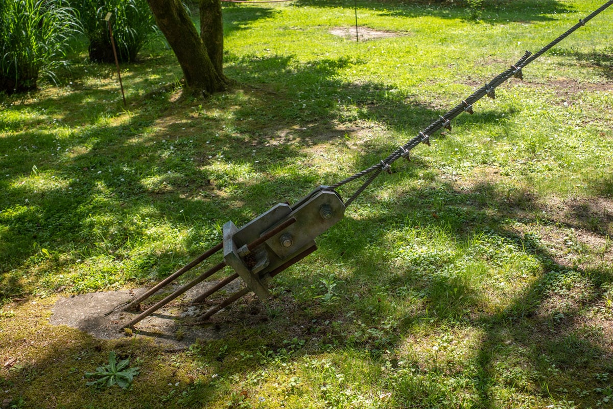 photo of a rod celvis turnbuckle installed on the ground for support