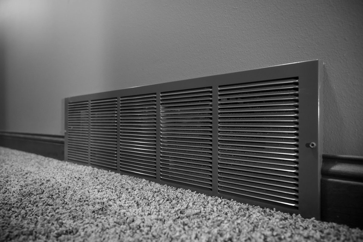 photo of an air vent inside of the modern class minimalist design gentlemen room