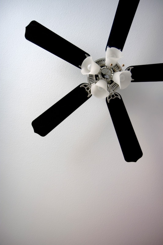 A black ceiling fan