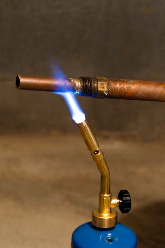 A blue propane torch