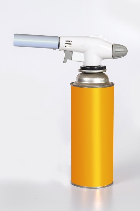 A butane torch on a white background