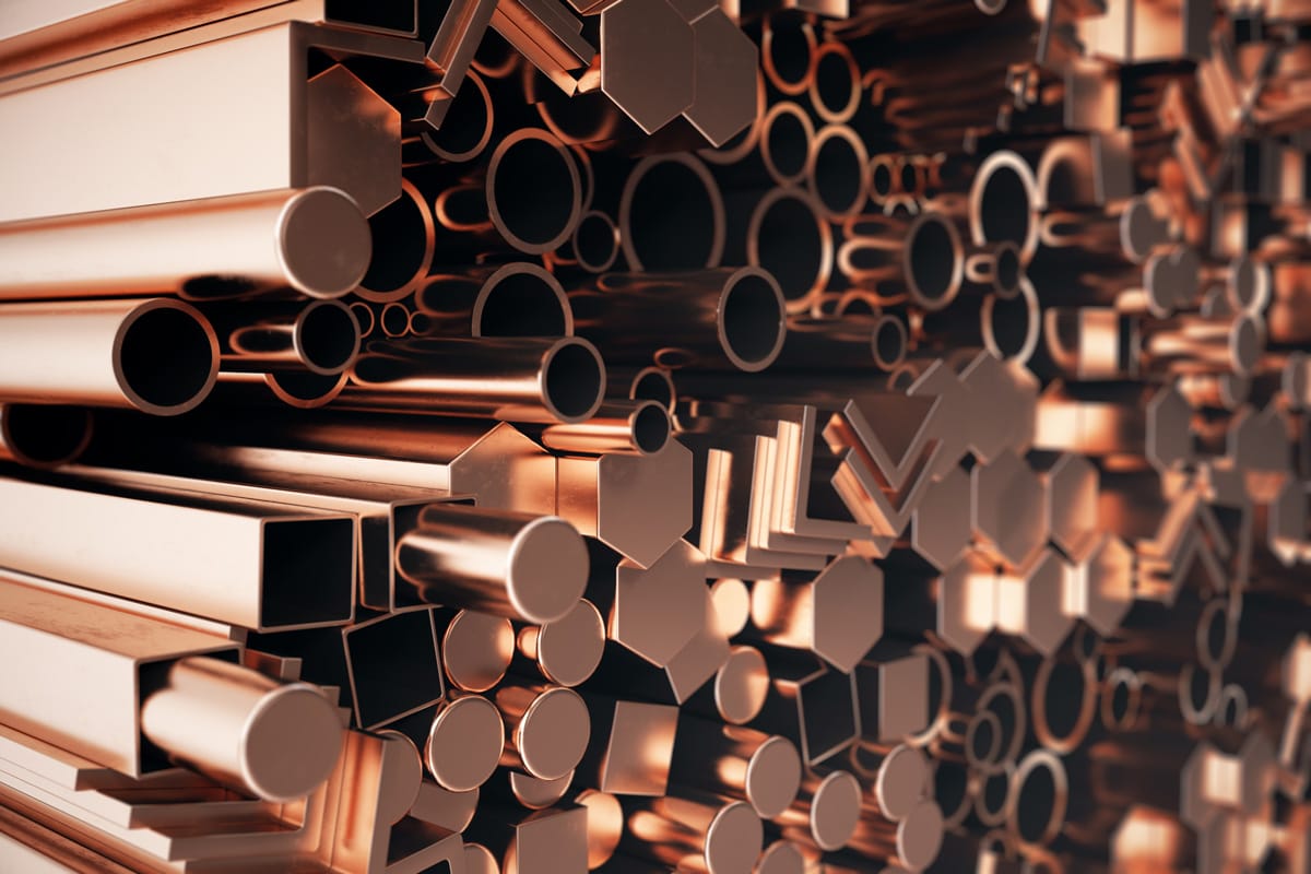 A stockpile of copper pipes