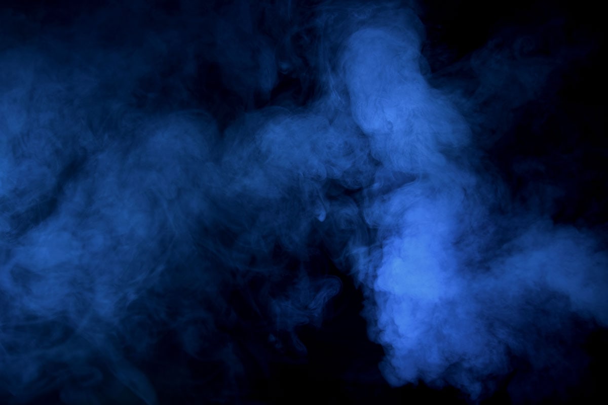 Abstract blue smoke black background