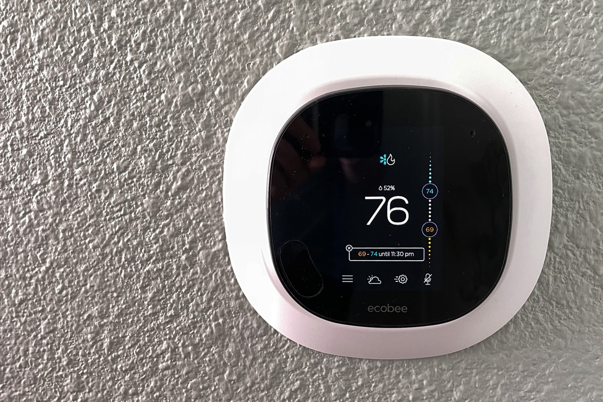 An Ecobee smart thermostat in a home.