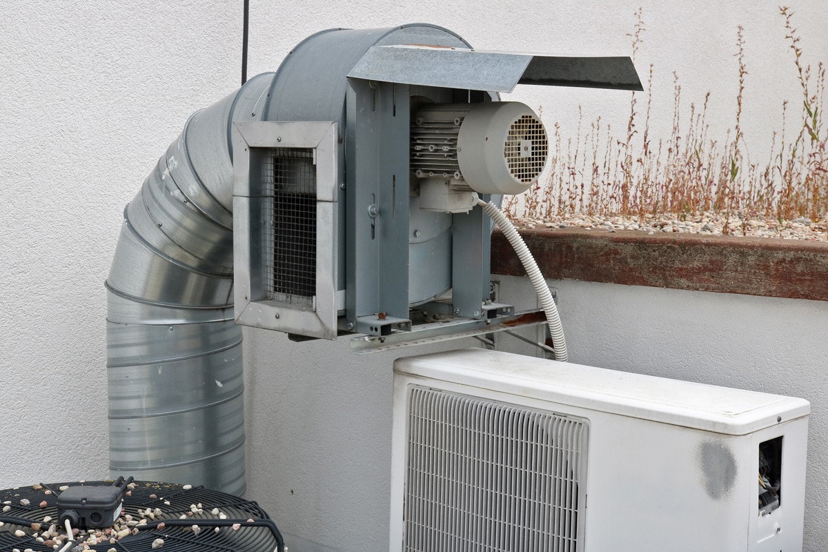 An air conditioning unit with a motor propelling the cold air to the air ducts