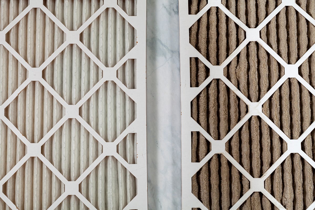 Cleaning Your Payne Heat Pump Filter - Side by side close up view of a new unused and an old heavily clogged dirty air filters.
