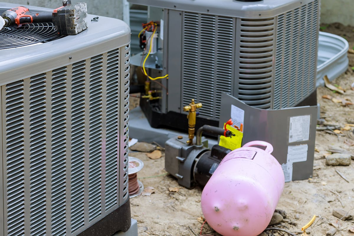 A compressor refueling the air conditioner with freon