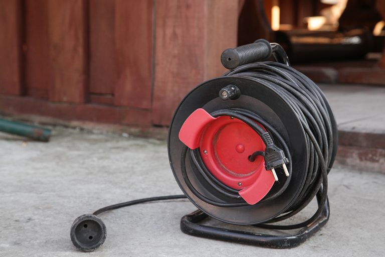 Electrical long extension cable cord on reel with remote socket, Can You Use An Outdoor Extension Cord Inside?