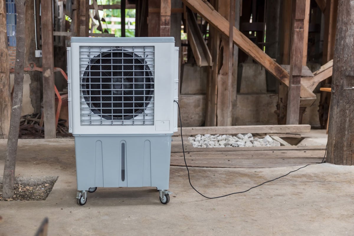 Evaporative Air Cooling Fan. Air conditioning. portable air cooler and humidifier on casters.