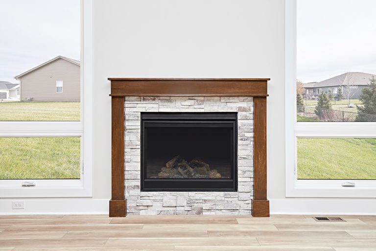 Gas fireplace in modern house from front view - Gas Fireplace Is Always Warm (Even When Not In Use) - Is This Normal