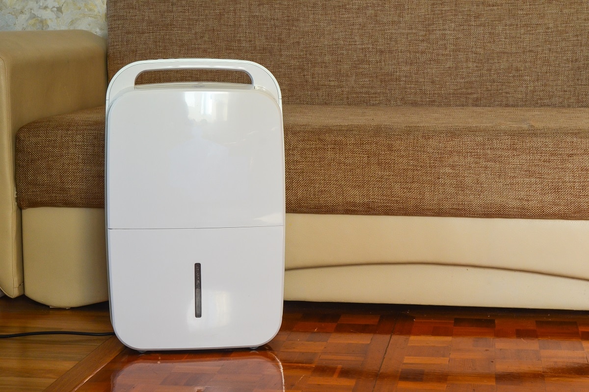 How Dehumidifiers Help Reduce The Humidity - dehumidifier in the room close up