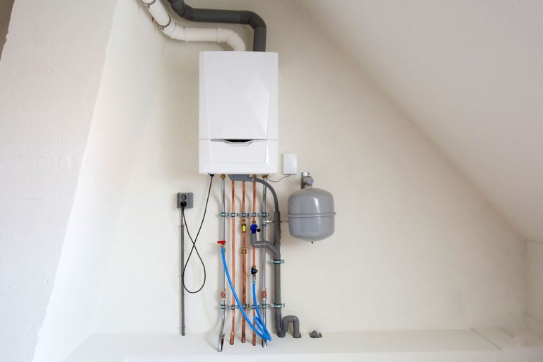 New gas boiler, Heating system with copper pipes, valves and other equipment in a boiler room gas, Furnace Rollout Switch Vs. High Limit Switch: What's The Difference?