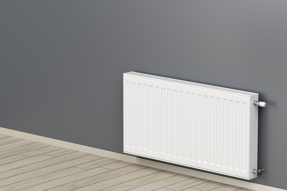 Conclusion - White heating radiator in the room,