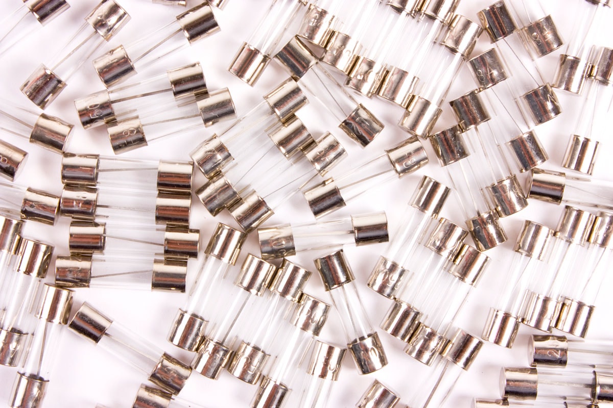 close up fuses many more on a white background table surface