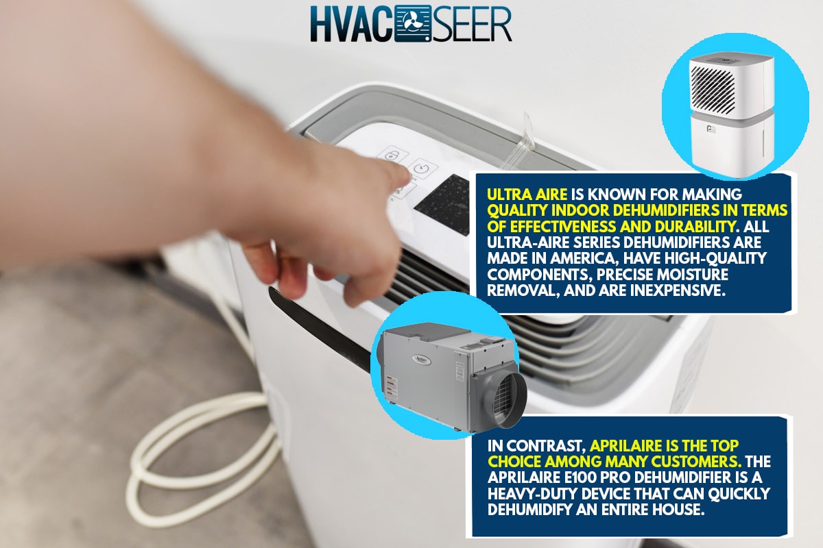 Man's hand turning on a dehumidifier in the entrance of a house or office, Ultra Aire Vs Aprilaire: Which Dehumidifier To Choose?