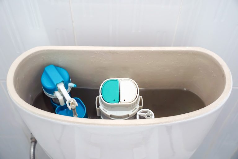 open toilet tank, repair toilet toilet tank that drains water, old toilet,Water valve mechanism - Roca Toilet Flush Not Working - Why And What To Do