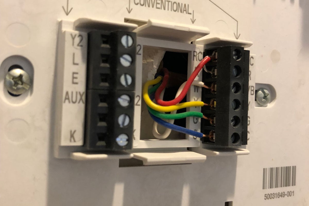 Installing a modern thermostat back of the modem