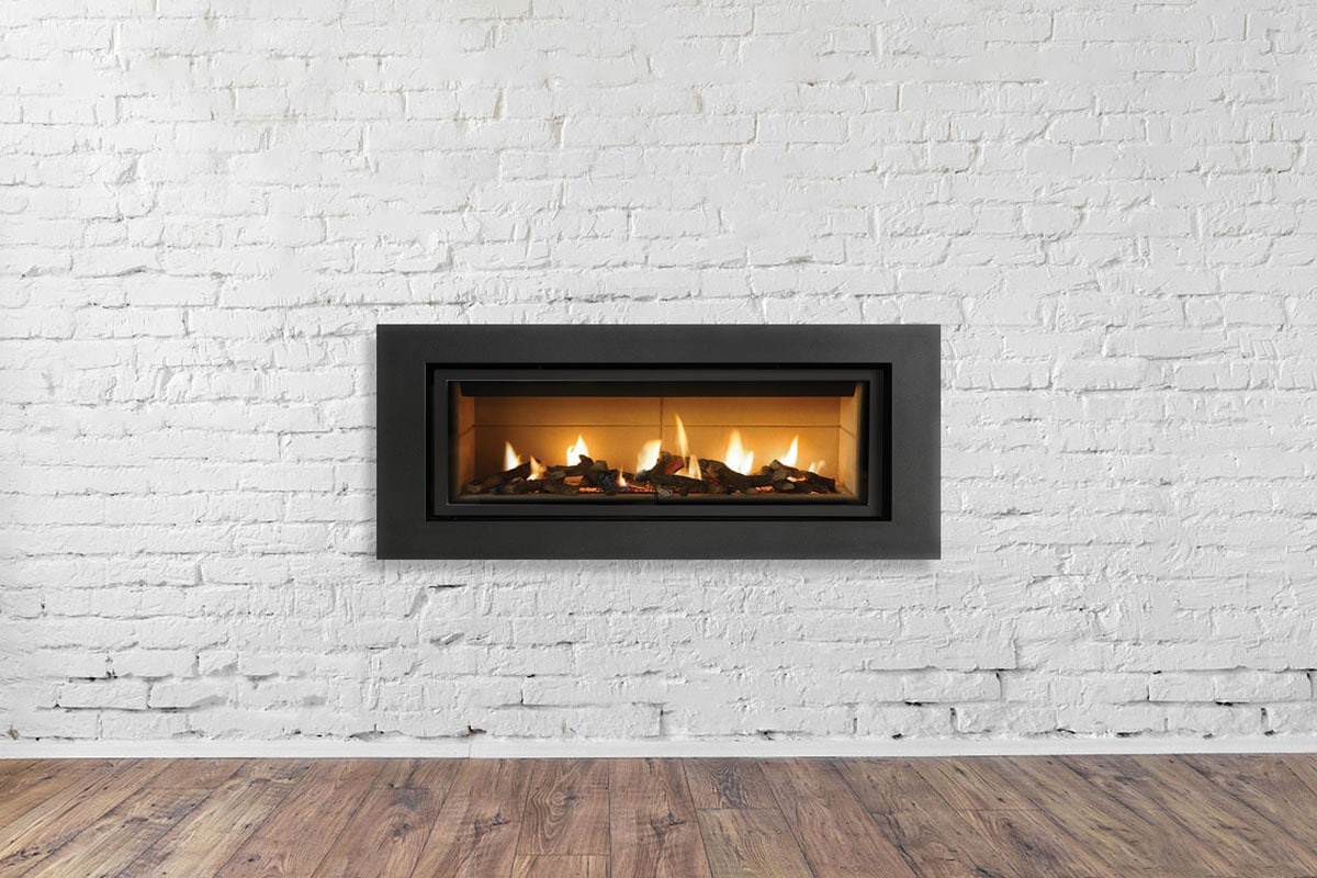 black gas fireplace on white brick wall very minimalist neat looking