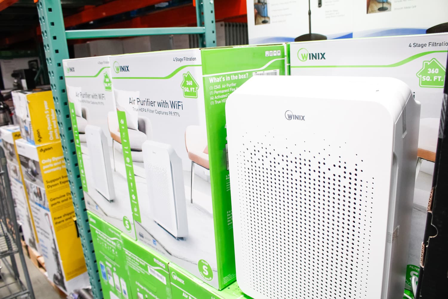 A view of several boxes of Winix air purifier with WiFi, on display at a local big box grocery store.