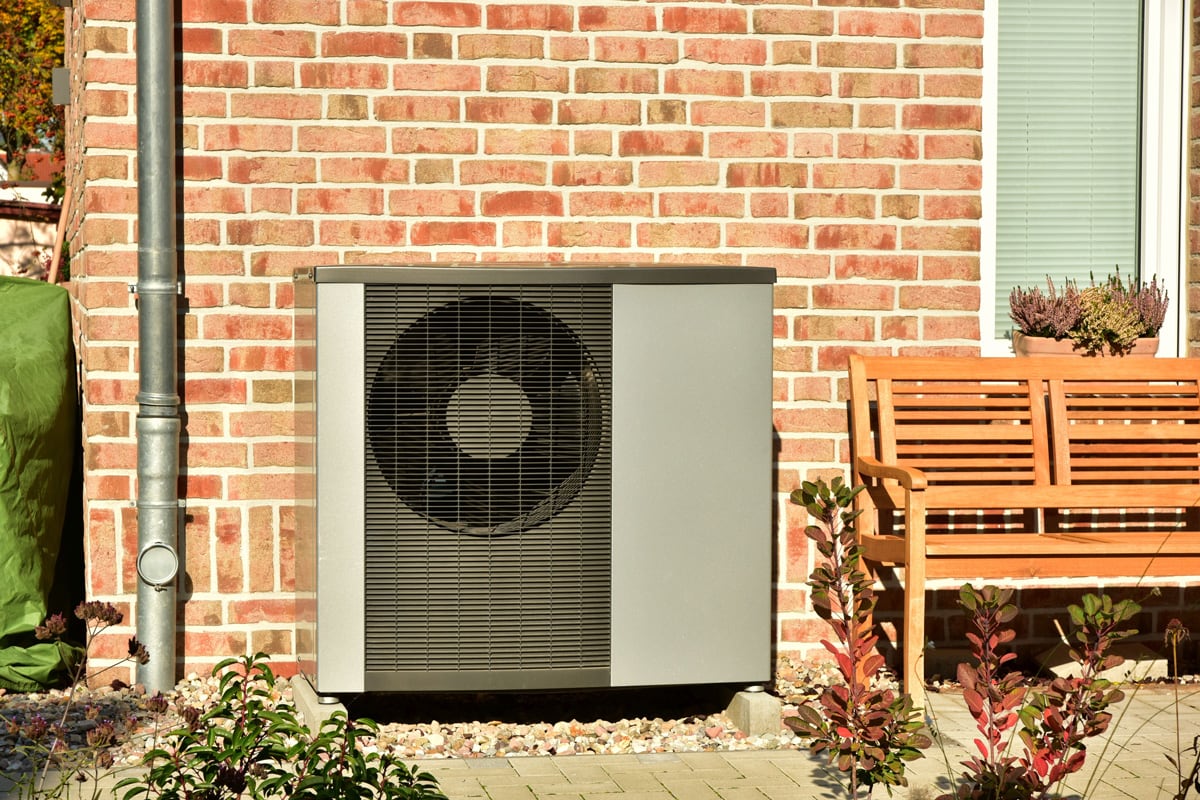 Air conditioner, Air-Air Heat Pump for Heating and hot Water in Front of an Residential Building.