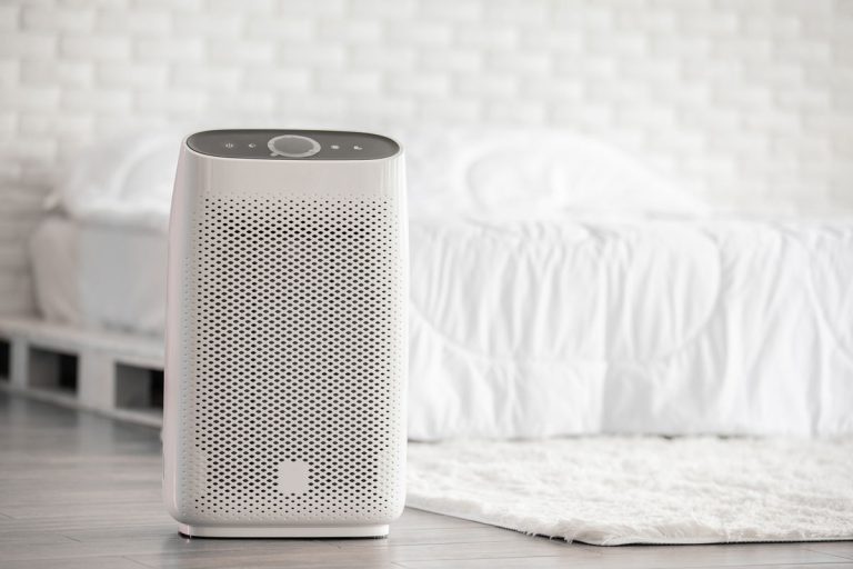 Air purifier in cozy white bed room for filter and cleaning removing dust PM2.5 HEPA in home,for fresh air and healthy, How To Clean A Bissell Air Purifier [Inc. Sensor]