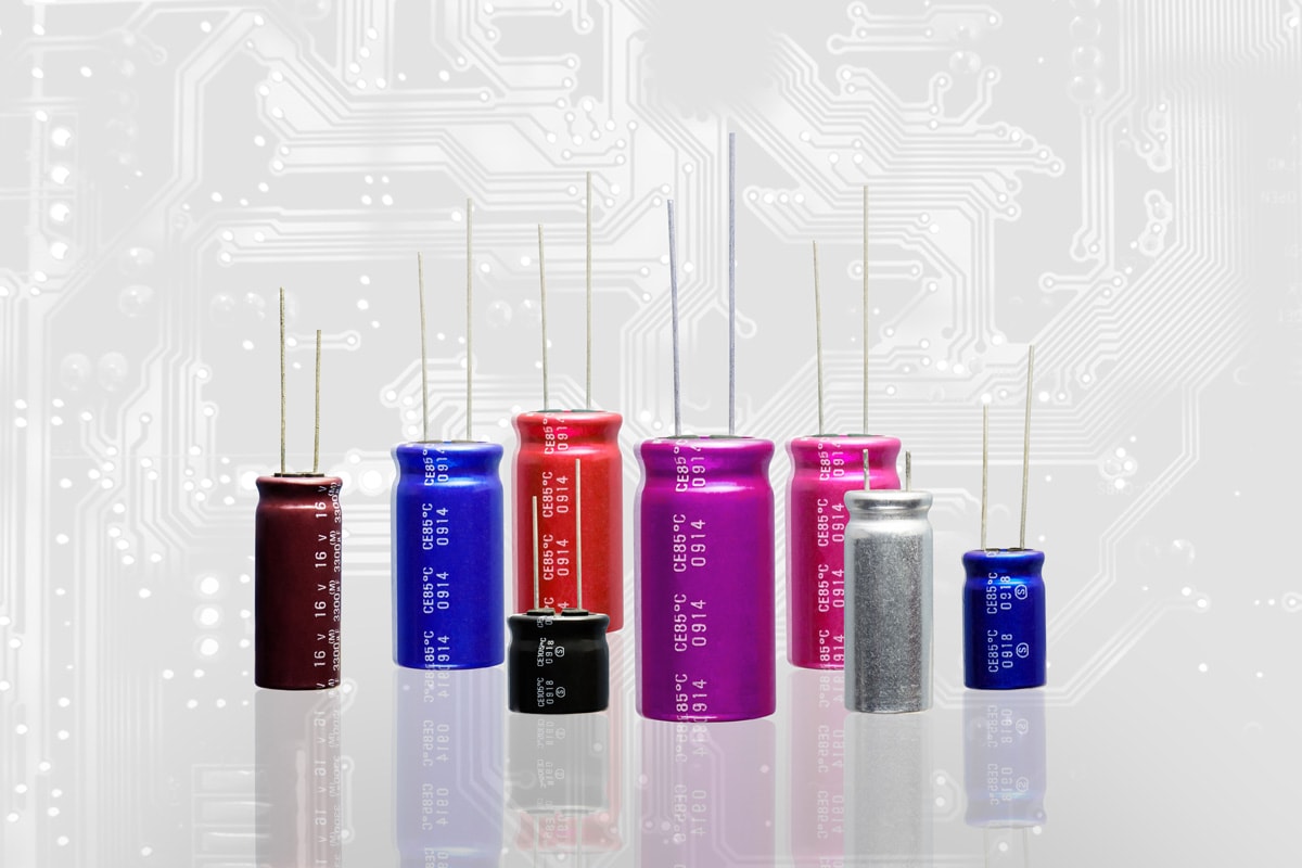 Electrolytic Capacitors, multi color and many sizes background, Double Exposure electronics part concept.