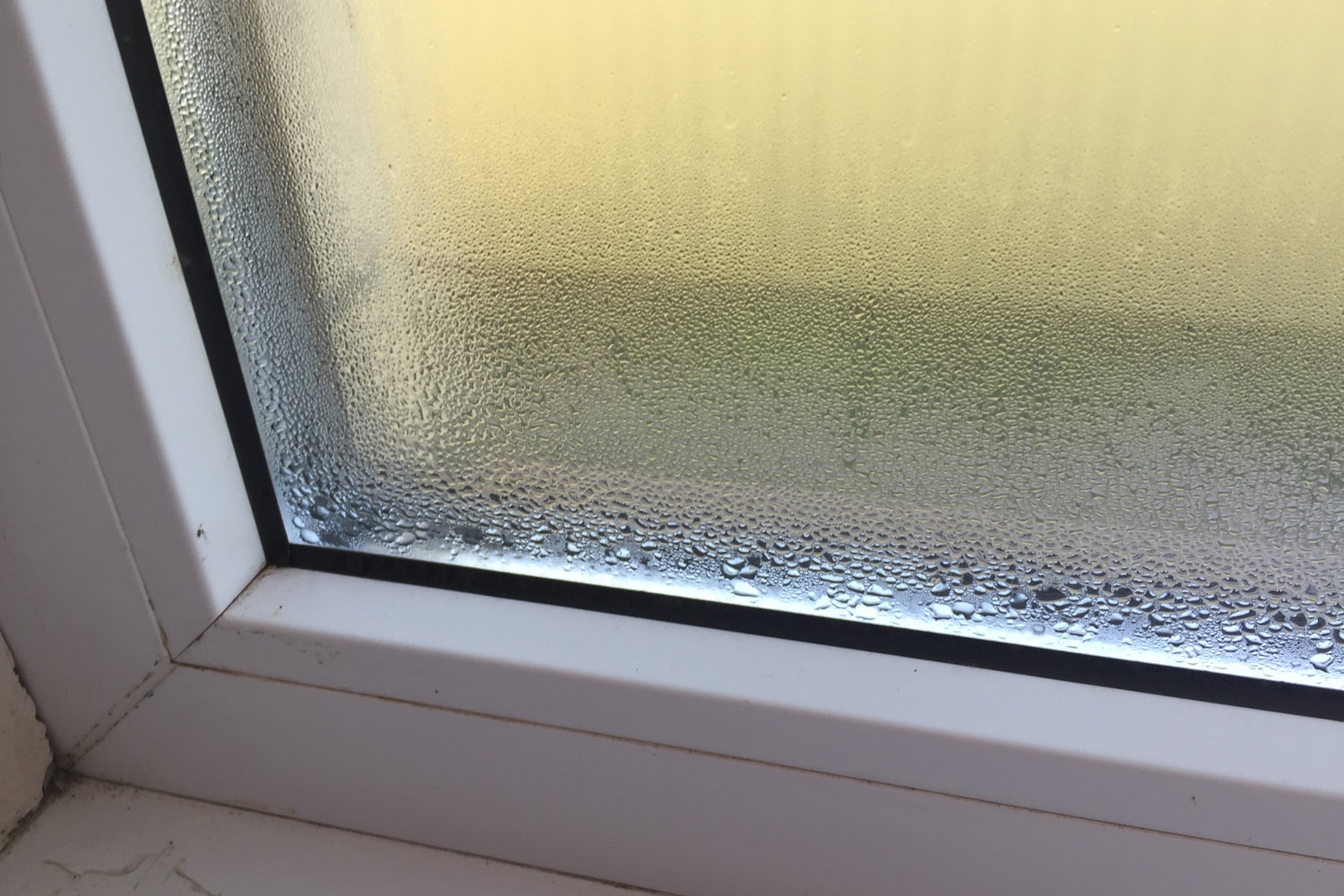 Fogged plastic window with condensation