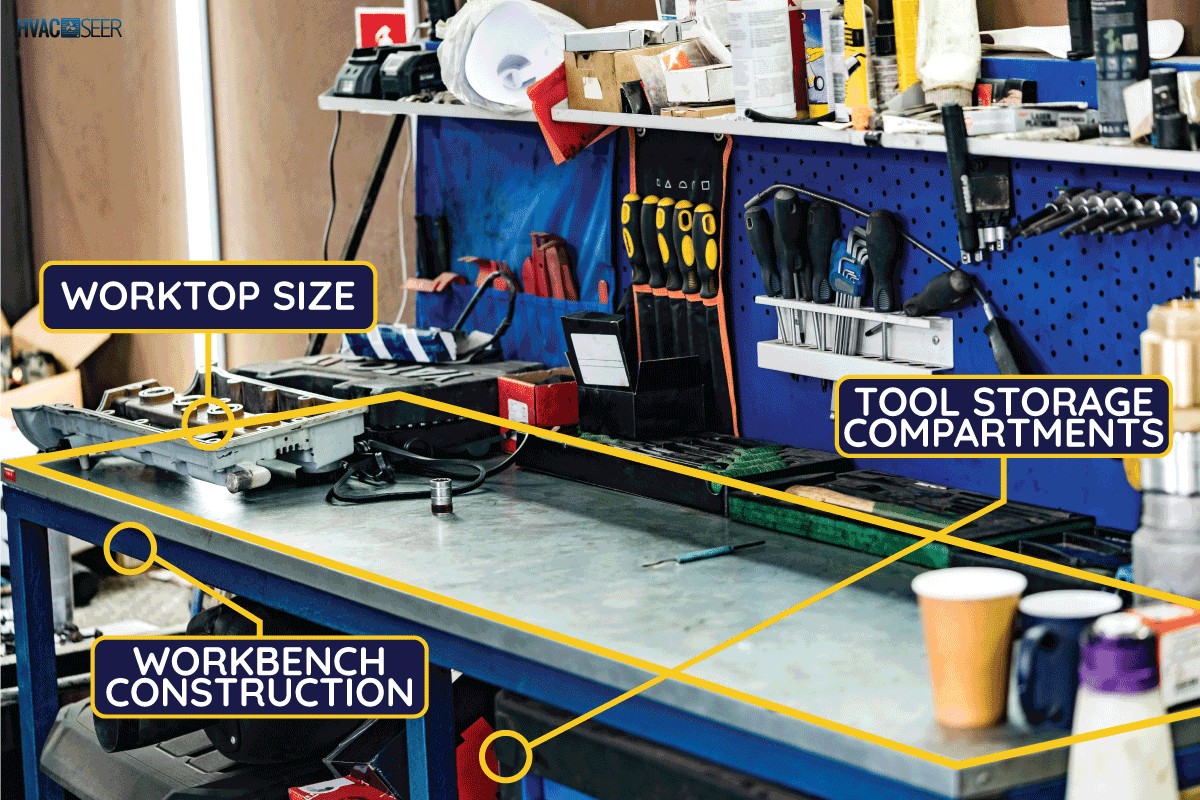 Large workbench with tools at station for vehicle technical servicing. How Tall & Long Should A Workbench Be [Ideal Dimensions For You]