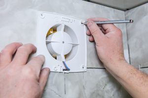 Read more about the article How To Vent A Bathroom Fan Through The Wall [Complete Guide]