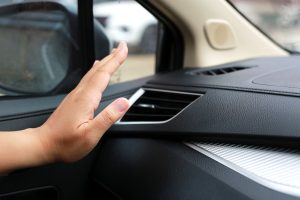 Read more about the article Why Does My AC Stop Working When Driving?