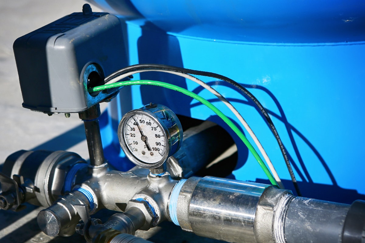 Water pressure gauge and storage tank.