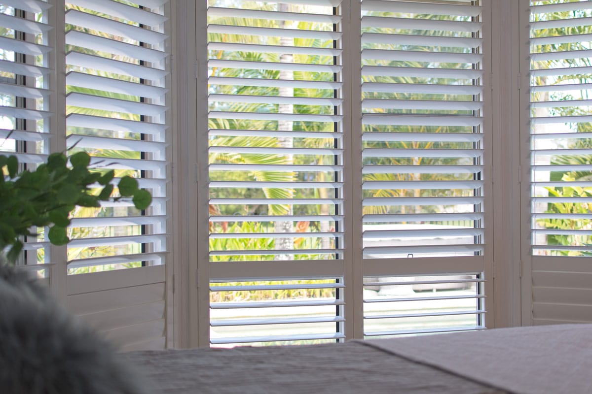 luxury-white-indoor-plantation-shutters-bedroom