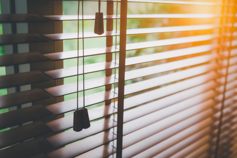 wooden-shutters-blinds-sun-light-windows, Do Blinds Or Shutters Cause Window Condensation?