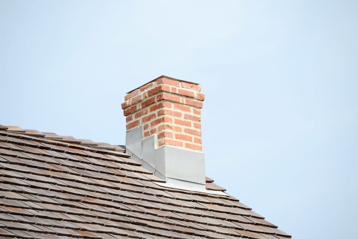 Chimney in the roof a brick type