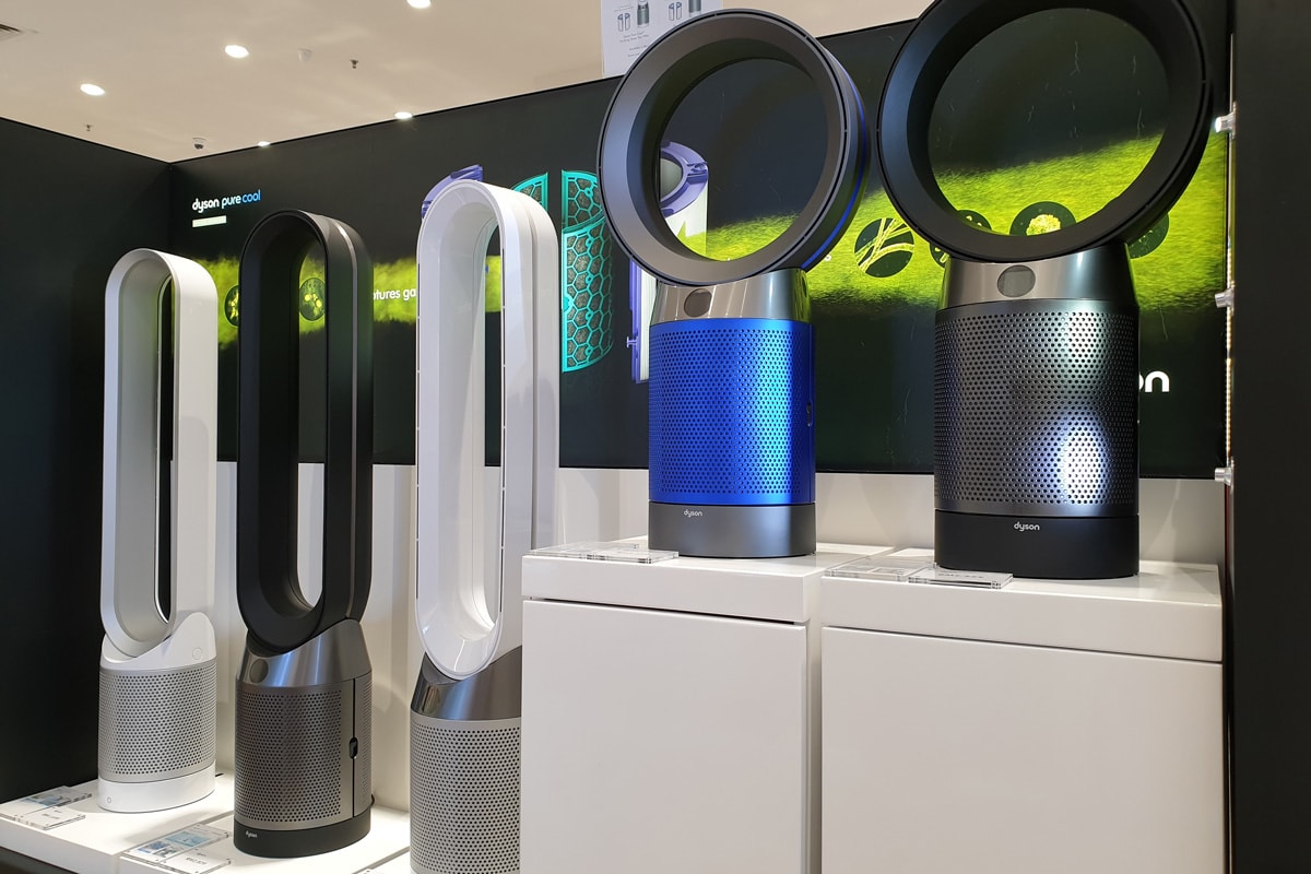 Dyson Pure Cool Purifying Tower Fan on store shelf.