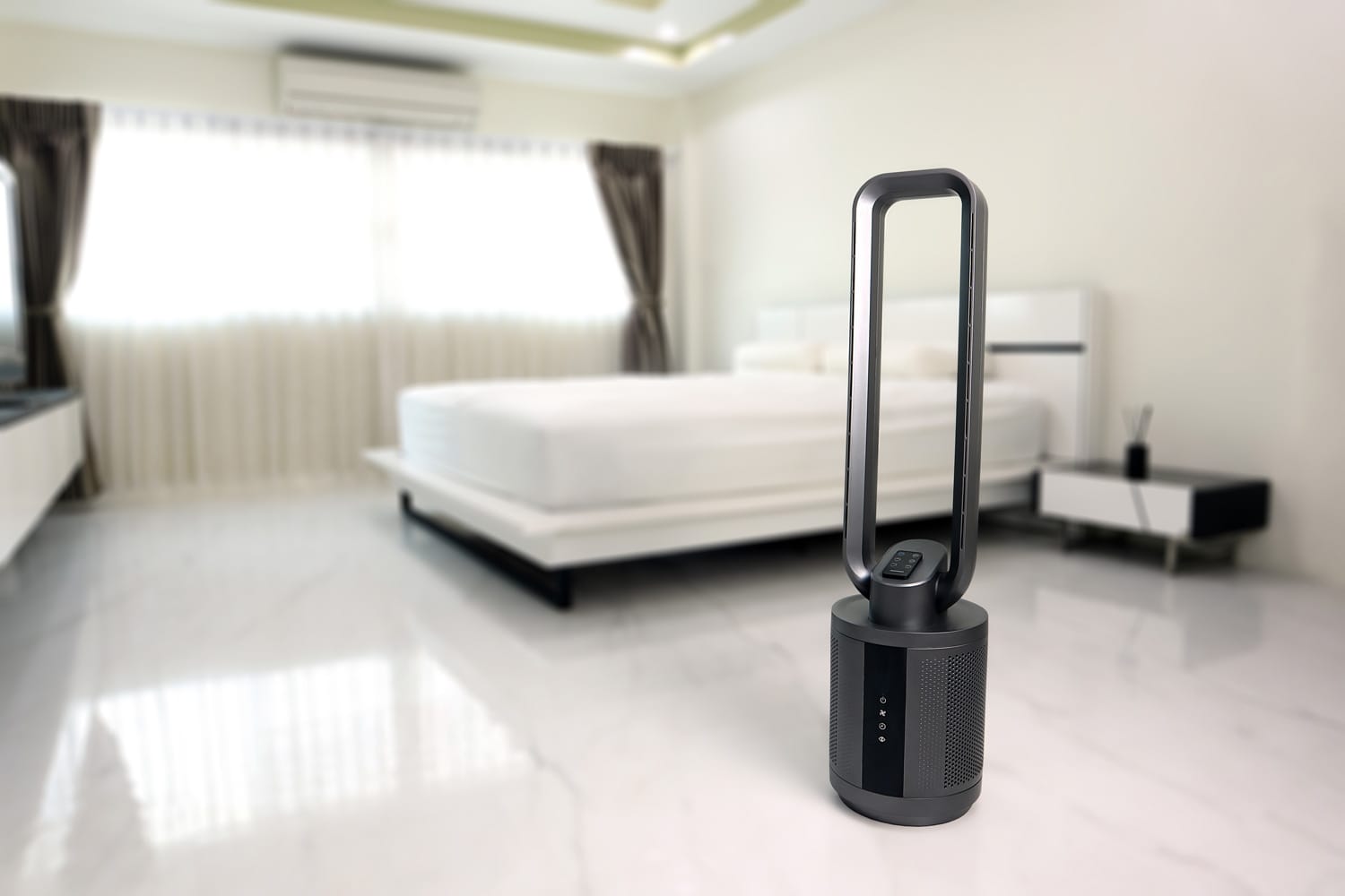 modern design black color bladeless purifying tower fan is on the floor of the nice white bedroom to create fresh cool air ambient in the summer 