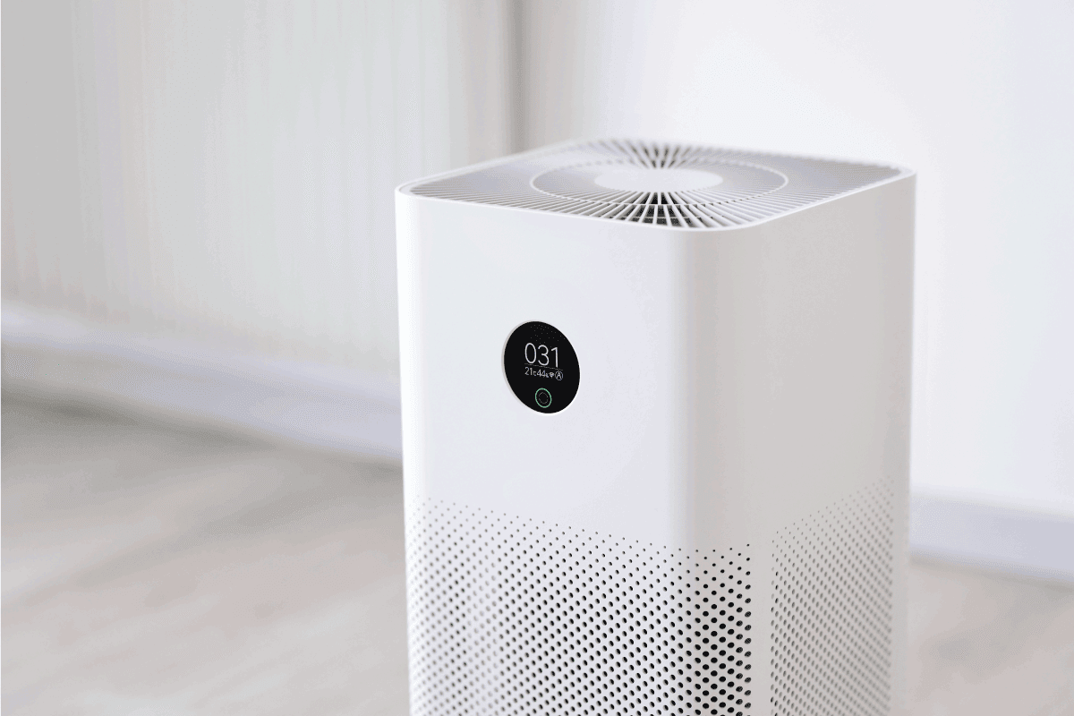 white box type air purifier in action inside a room freshly cleaned