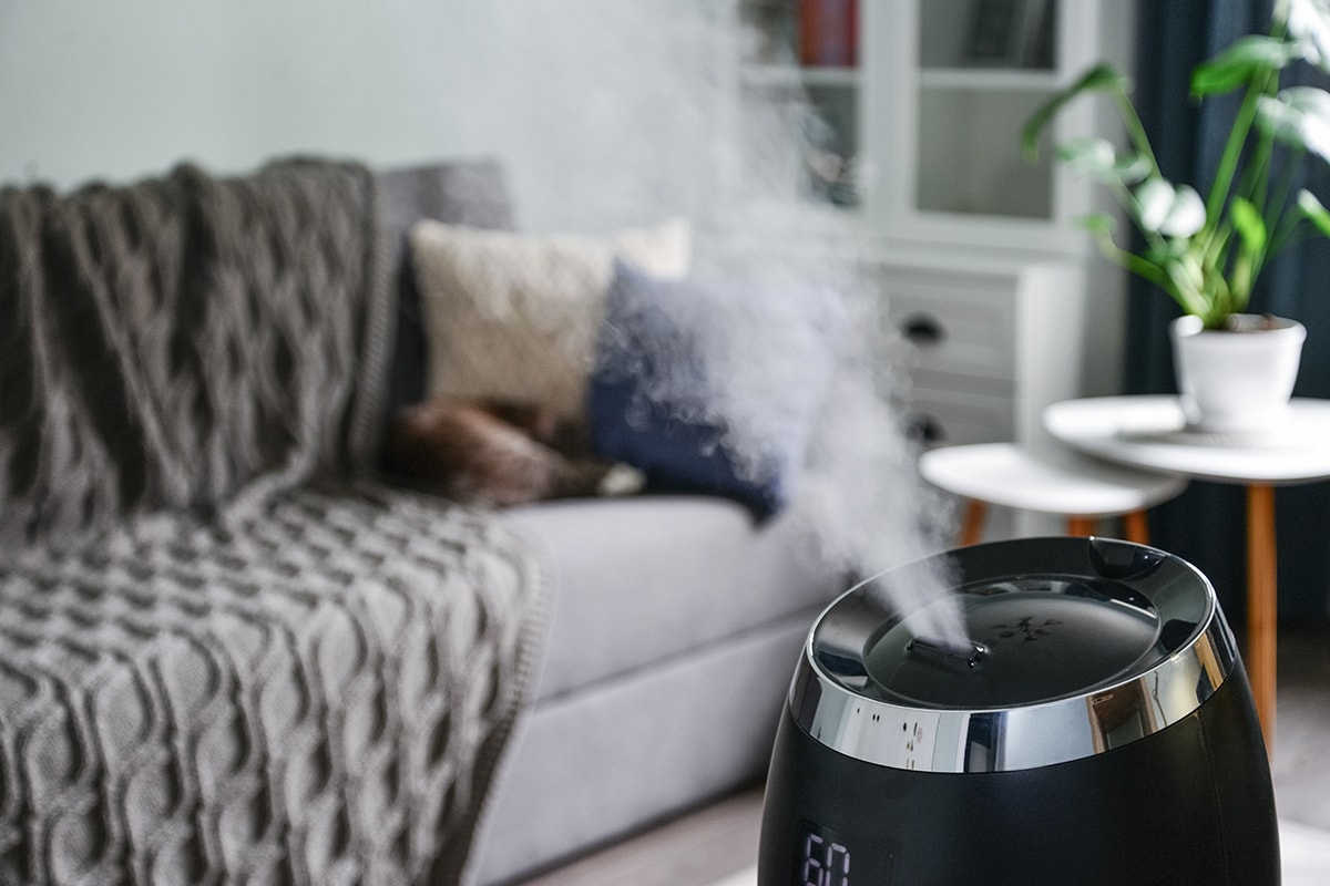 Cool mist humidifier on a small table in living room