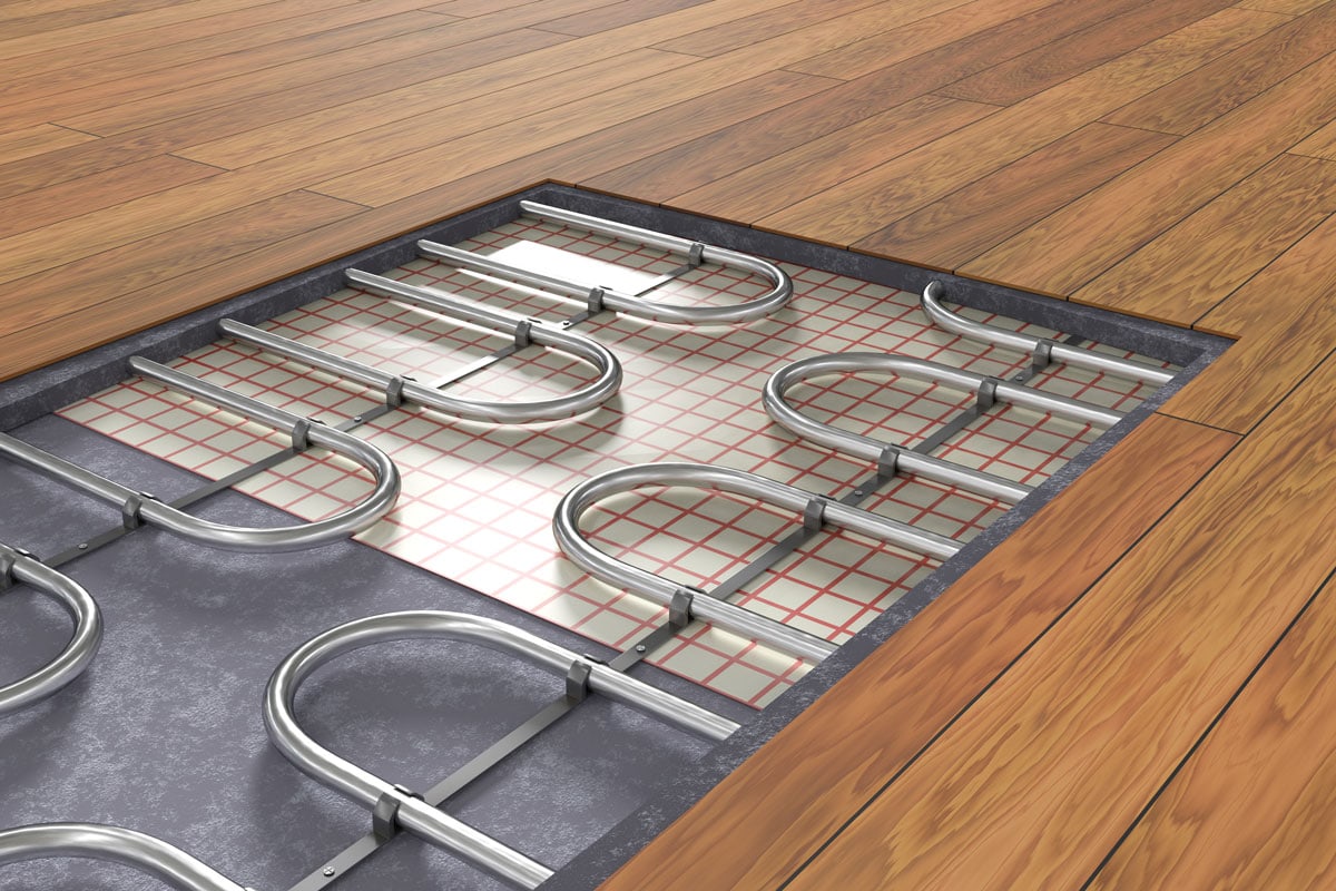 Underfloor heating system under wooden floor