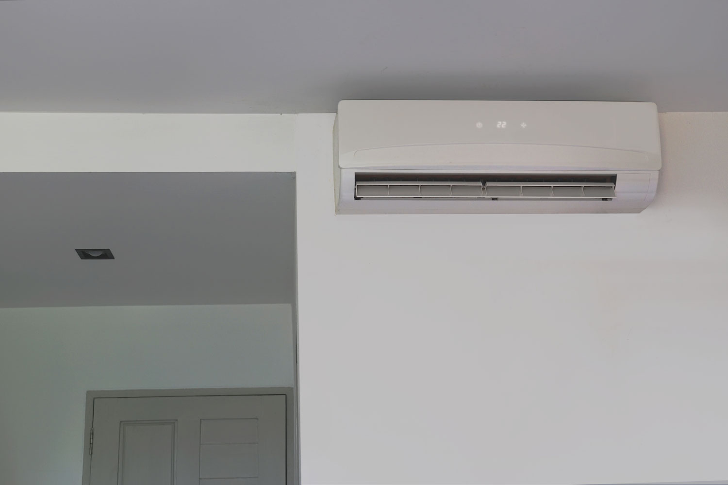 Wall mounted air conditioner that is installed in the bedroom. 