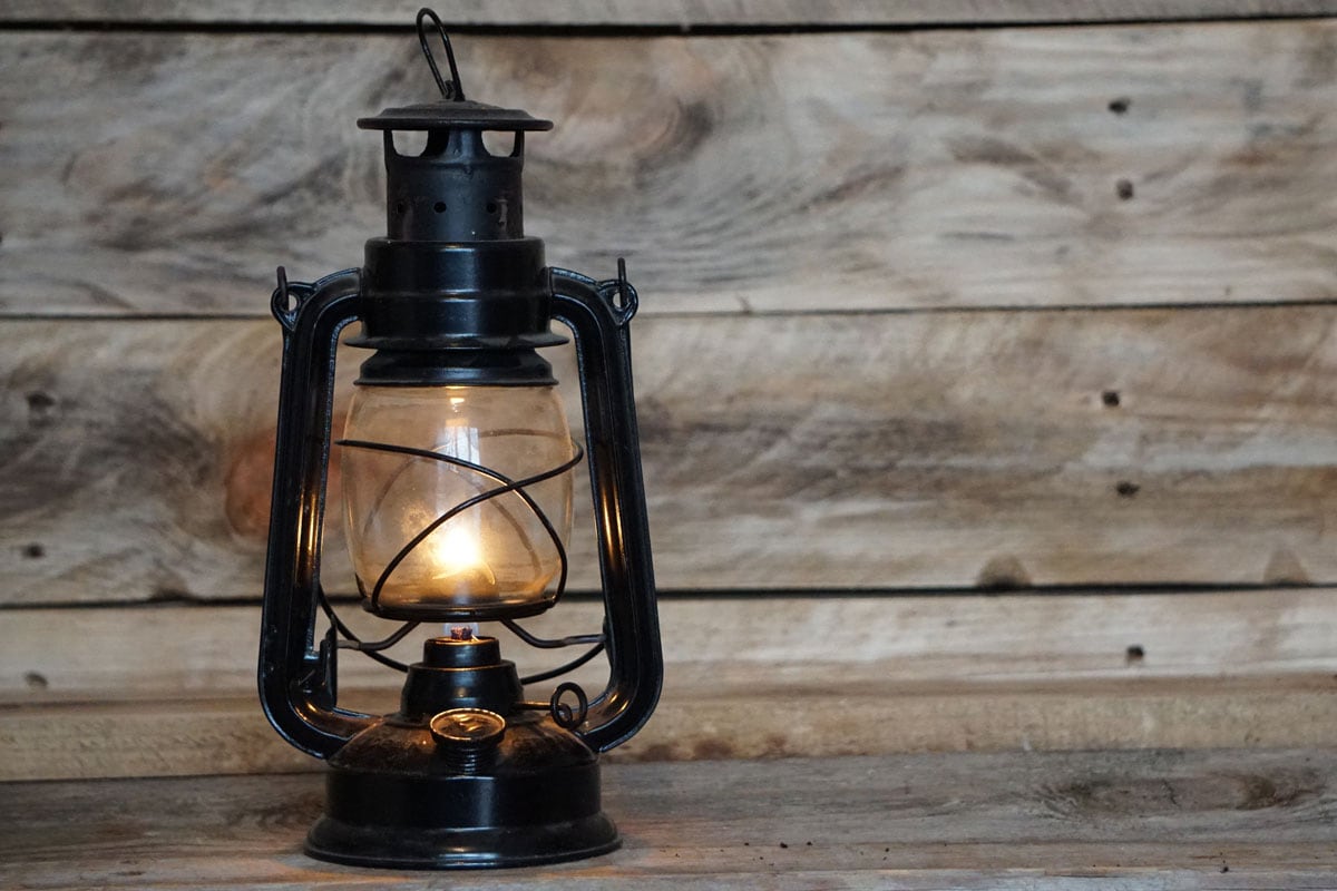 rustic board light antique old kerosene lamp wooden background