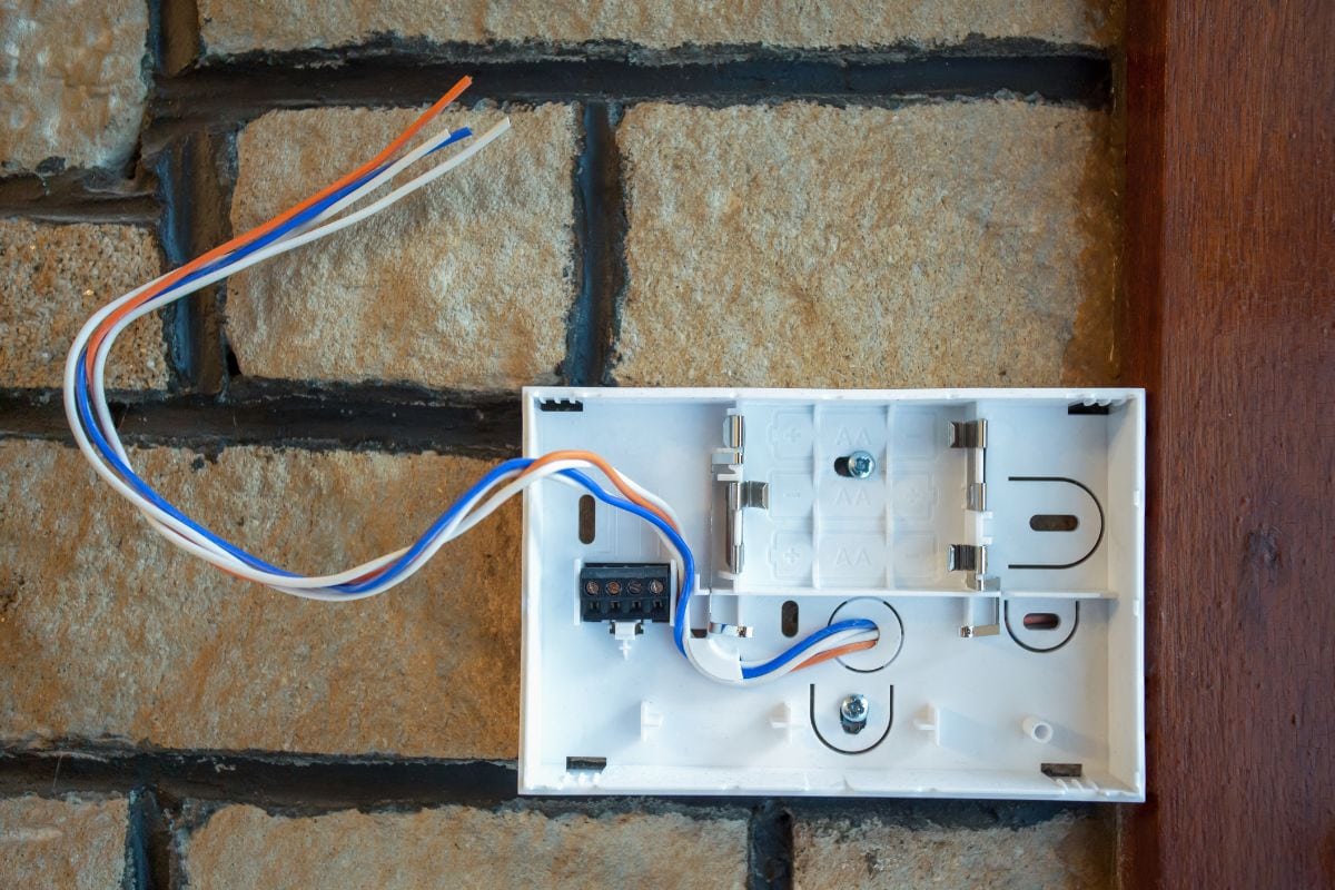 the body of a connection thermostat with the electrical wires through it
