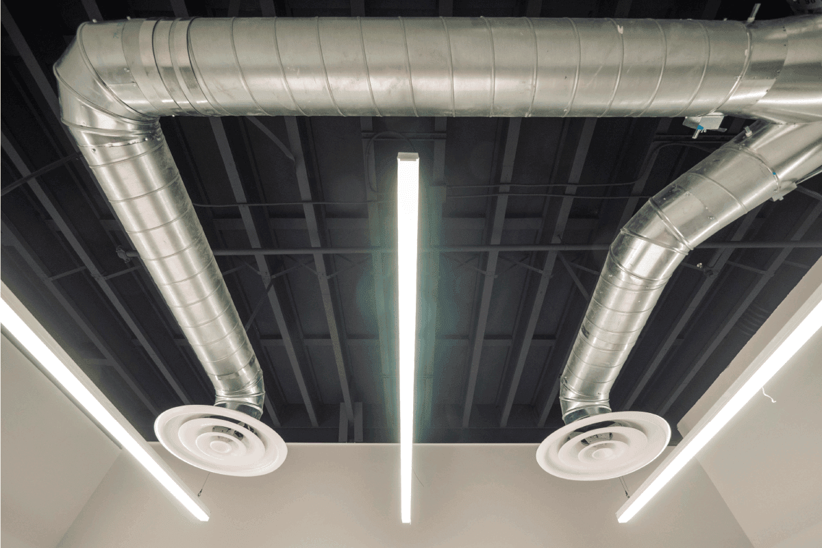 Air conditioning ducting with round diffuser and LED lighting