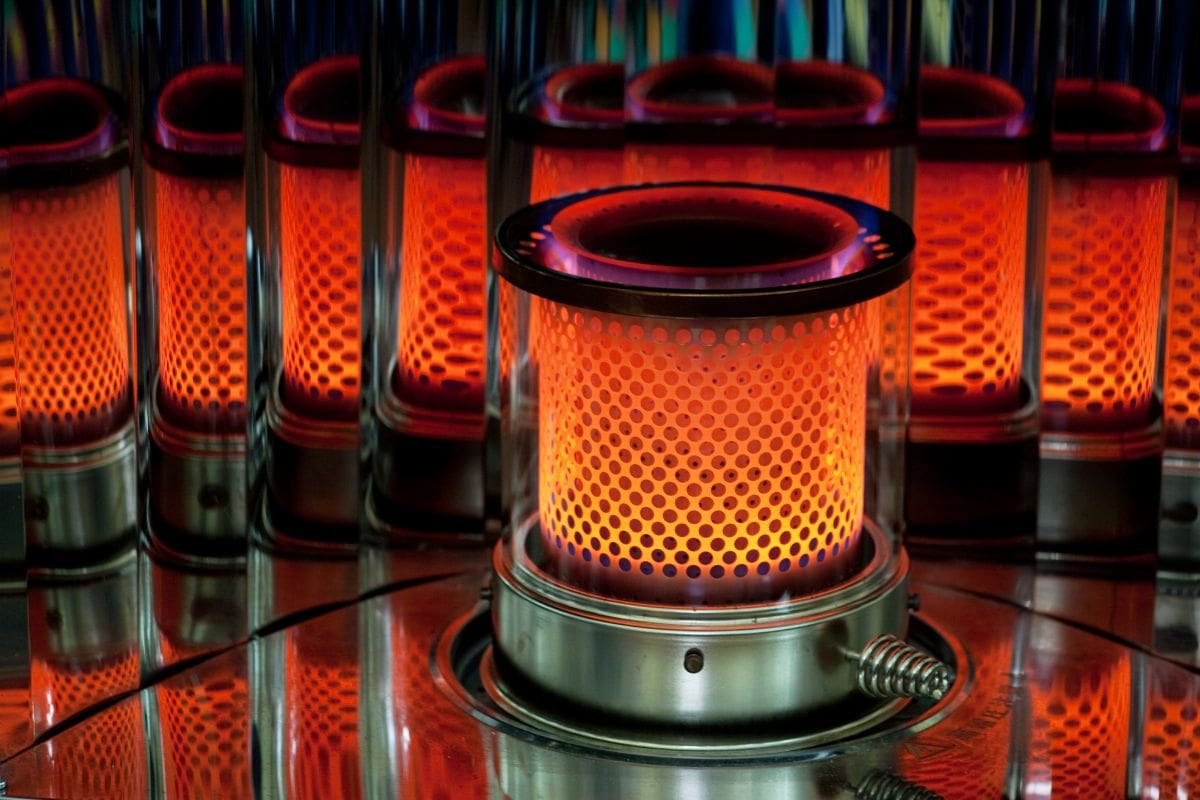 Red flame of oil heater. Kerosene heater; oil stove.