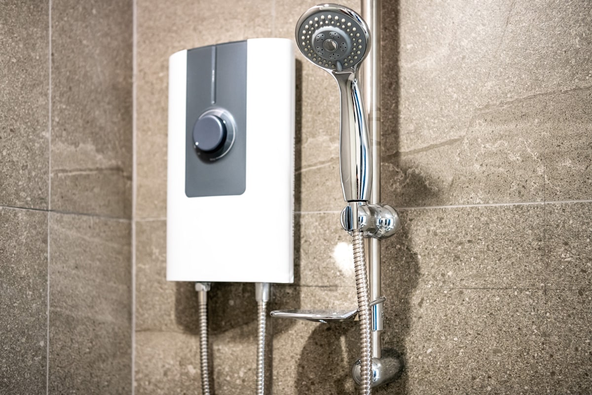 Shower and electric water heater in the bathroom