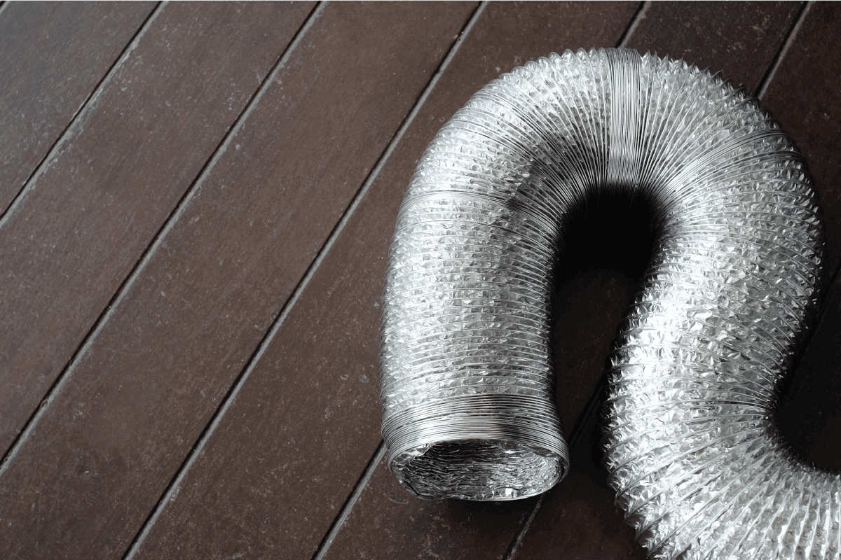 aluminum duct ready for use on the wooden floor